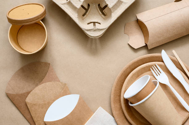 istock Eco craft paper tableware. Empty space in the center of the frame. 1367543522