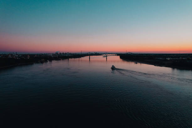 istock Boat on the Mississippi at Sunset 1367543675