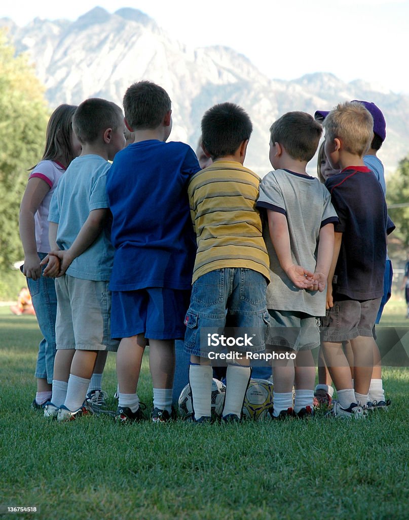 Team Huddle  Child Stock Photo