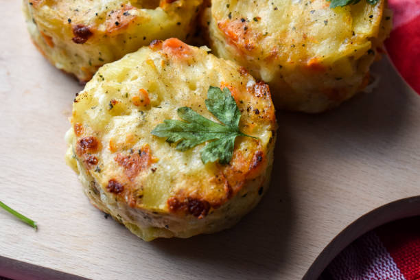 istock Potato gratin balls on a wooden cutting board 1367546655