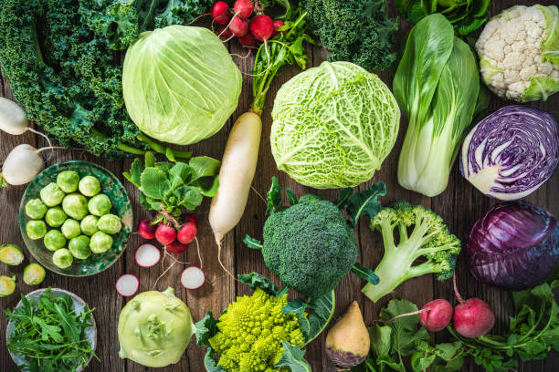 istock Crucifers vegetables assortment as cabbage, broccoli, cabbage, turnip, kale, romanesco, radish, arugula 1367552399