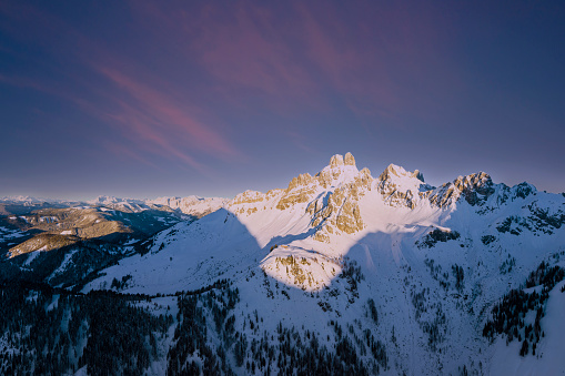 Aerial view in the alps at sunrise with a view of Bischofsmütze in the Dachstein mountains