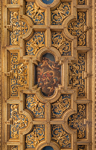 Rome - The baroque coffered ceiling in the church Basilica di San Crisogono is and depicts the Glory of Saint Chrysogonus by Guercino (1591 - 1666).