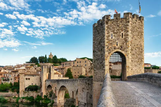 medieval village of Besalú en Girona, Catalonia, Spain. Foreground of medieval bridge - Nacional park of Garrotxa