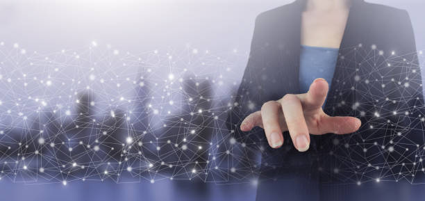 istock Business network communication and innovation technology concept. Hand touch digital screen hologram data wave sign on city light blurred background. 1367555476