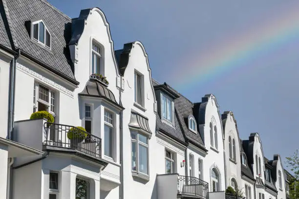 rainbow over hamburg luxury houses