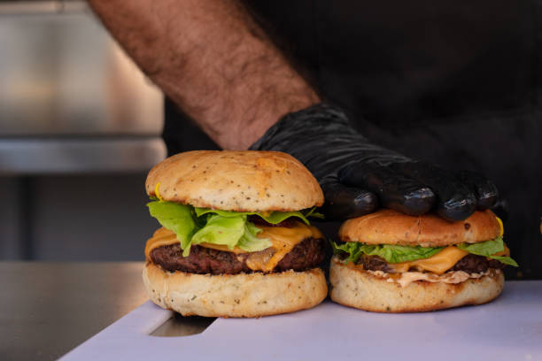 istock Finished hamburgers on a table 1367562148