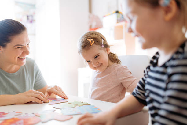 istock Mother and daughters playing and enjoying time together 1367563268