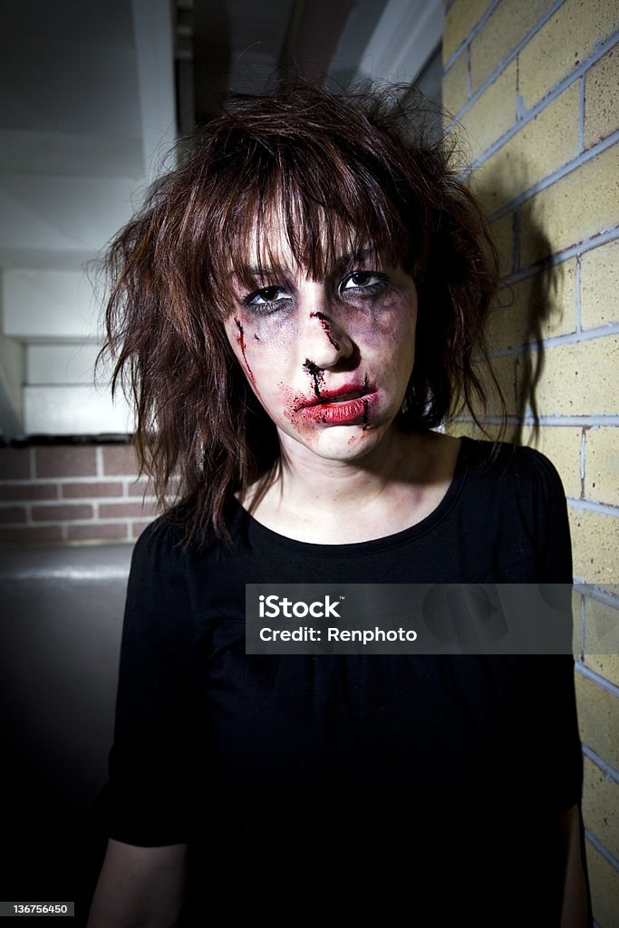 Battered Woman Battered Woman *This was set up - we used a model and special effects makeup artist* Adult Stock Photo