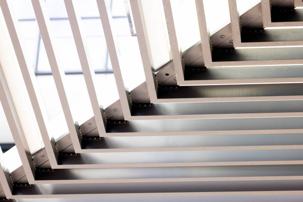 istock Closeup modern metal beams ceiling, background with copy space 1367564530