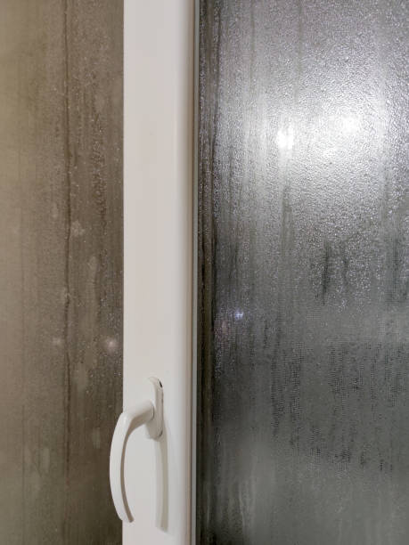istock condensation on a plastic window close-up, high humidity 1367567488