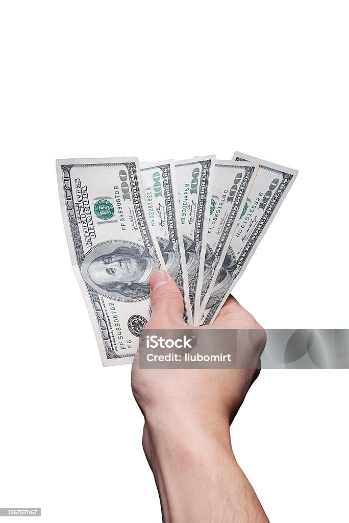 giving 500 dollars Hand offering five hundred US dollar banknotes isolated on white USA Stock Photo