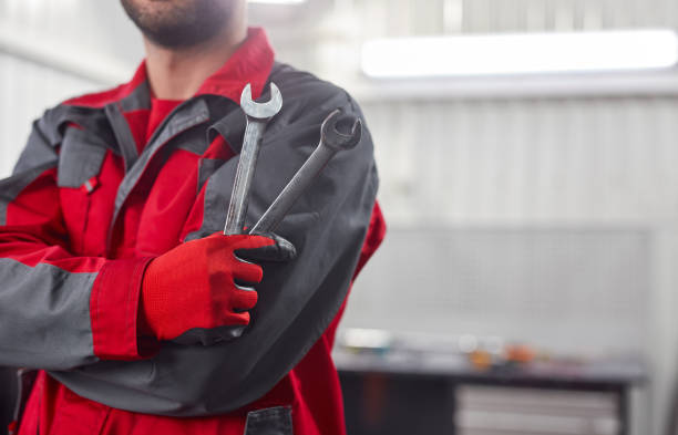 istock Crop mechanic with wrenches in workshop 1367581771