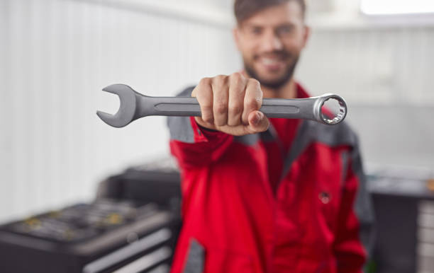 istock Crop mechanic with wrench in workshop 1367581772