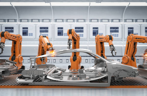 robot assembly line in car factory stock photo