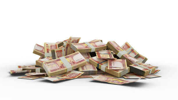 istock 3D Stack of 1000 Afghanistan Afghani notes isolated on white background 1367587090