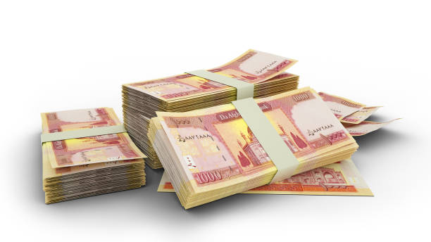 istock 3D Stack of 1000Afghanistan Afghani notes isolated on white background 1367587211