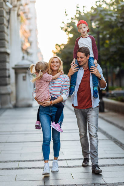 istock Loving parents with their goofy kids 1367592148