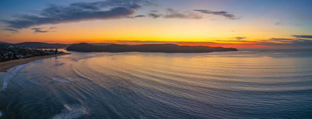 Sunrise seascape panorama with clouds stock photo