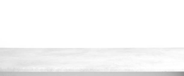 istock Empty white cement table over white cement concrete wall background, banner, table top, shelf, counter design for product display montage 1367602586