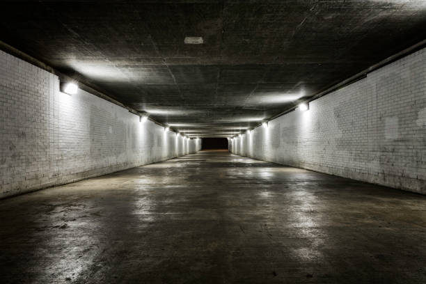Empty tunnel with lights stock photo