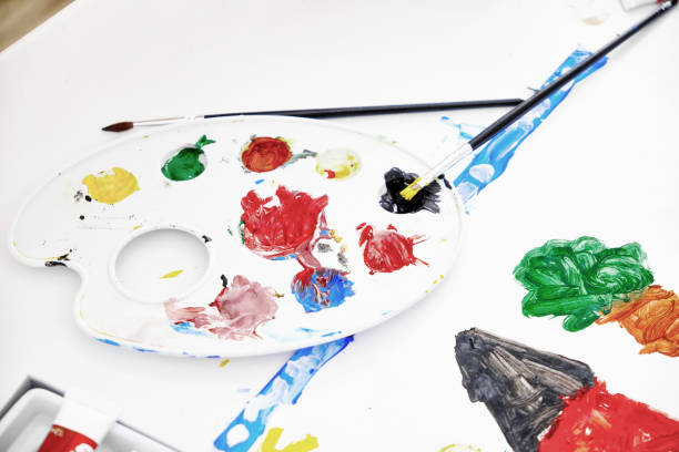 istock Painting, artist palette and paintbrushes 1367621716