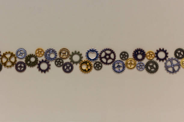 Group of gears on a brown background. Concept of business idea, teamwork, strategy, cooperation. Copy space, flat lay.
