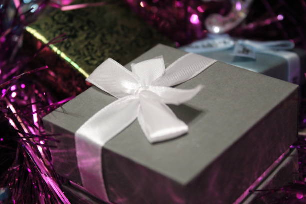 Paper christmas ornaments and gift backgrounds still life at home, photo taken indoors at home, preparing for christmas