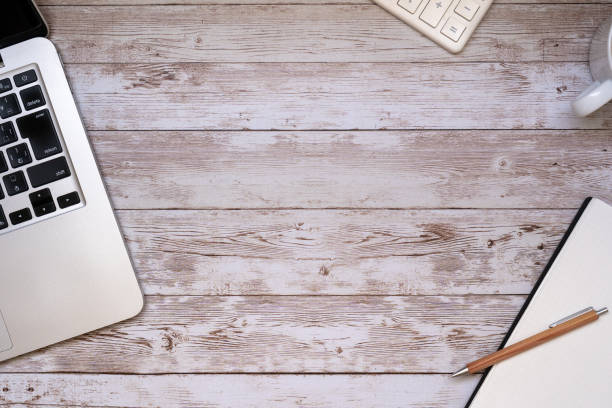 istock A laptop, a notebook, pencil, and a calculator. 1367624767