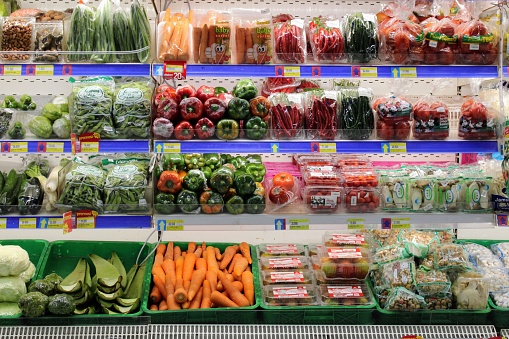 Various fruits and vegetables displayed in the supermarket