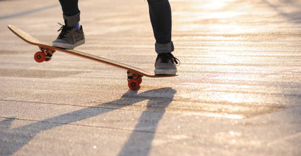 istock Skateboarder with skateboard outdoors in city 1367629405