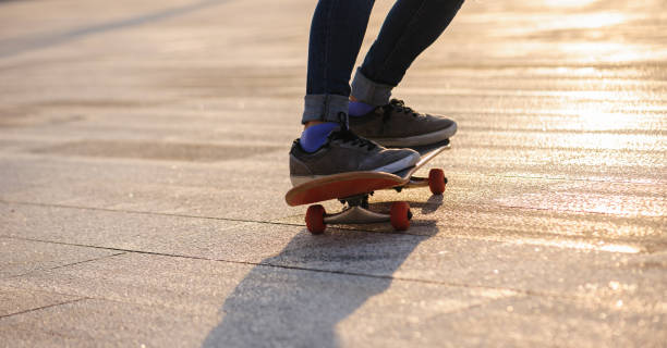 istock Skateboarder with skateboard outdoors in city 1367629429