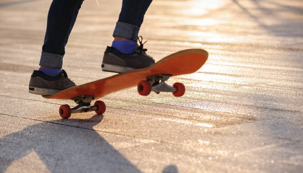 istock Skateboarder with skateboard outdoors in city 1367629442
