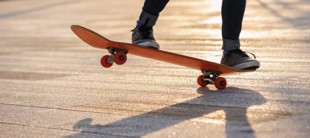 istock Skateboarder with skateboard outdoors in city 1367629515