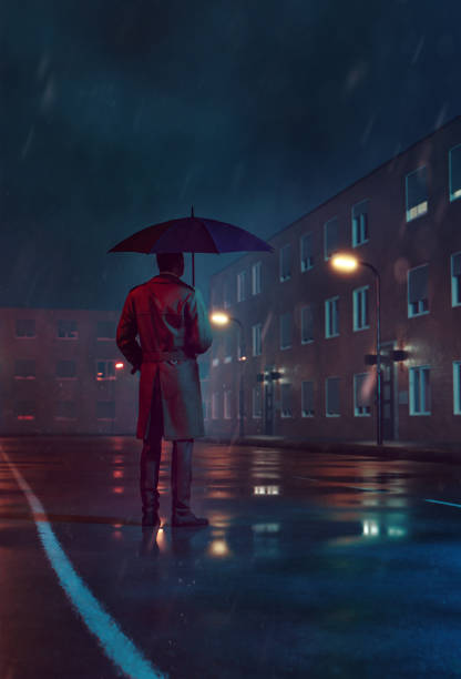Mystery man stands alone in the rain with umbrella and watches a house Concept image. Man with umbrella and coat stands outside while it rains at night. He looks at a building. He could be a detective, spy or a thief on a surveillance task. creepy stalker stock pictures, royalty-free photos & images