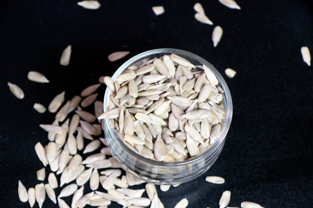 istock heaps of melon seeds in a bowl 1367630556