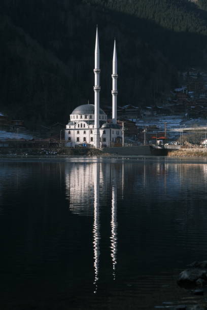 istock mosque reflection on water, mosque in uzungol lake in trabzon 1367635665