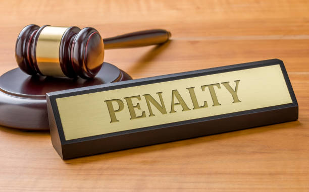 istock A gavel and a name plate with the engraving Penalty 1367636121