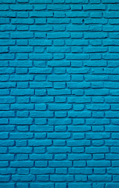 istock Vertical Image of Atlantic Blue Colored Old Brick Wall for Abstract Backdrop 1367638165