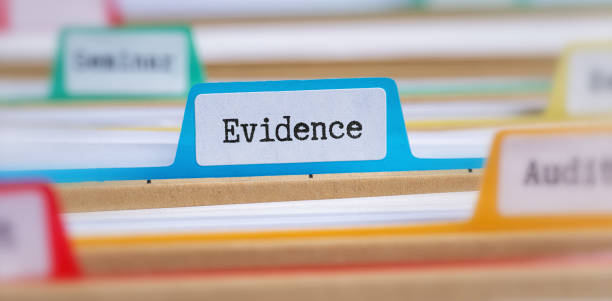 File folders with a tab labeled Evidence stock photo