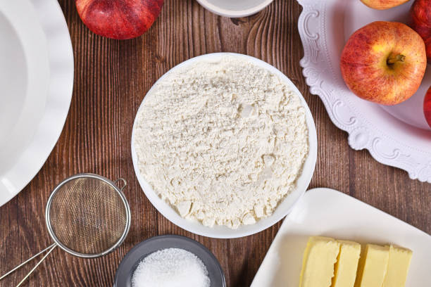 istock Bowl of flour surrounded by other pie crust ingredients 1367644680