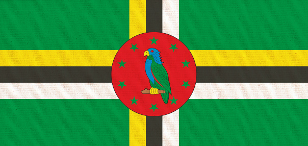 flag of Dominica. National Dominica flag on fabric surface. national flag on textured background. Fabric Texture. Republic of Dominica