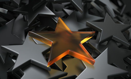 Orange glass star with other stars