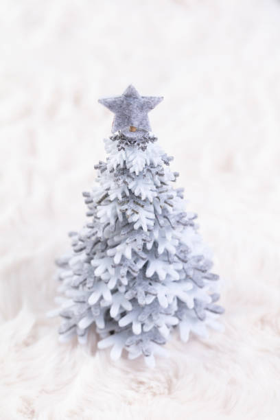 istock Christmas little trees and wool background 1367646317