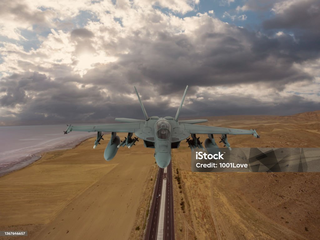 Jet fighters flying over highway in Salt Lake F-18 Jet fighters flying over clouds. FA-18 Hornet Stock Photo
