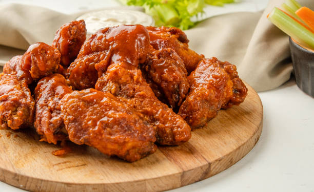 istock Traditional buffalo wings. American cuisine. 1367647840