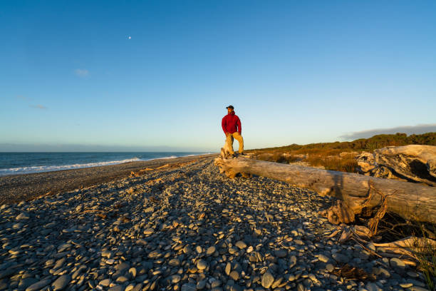 istock Man on beach to enjoy holidays. 1367651542