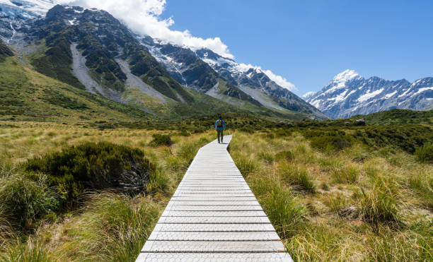 istock Walking on footpath in mind of mountain. 1367651606