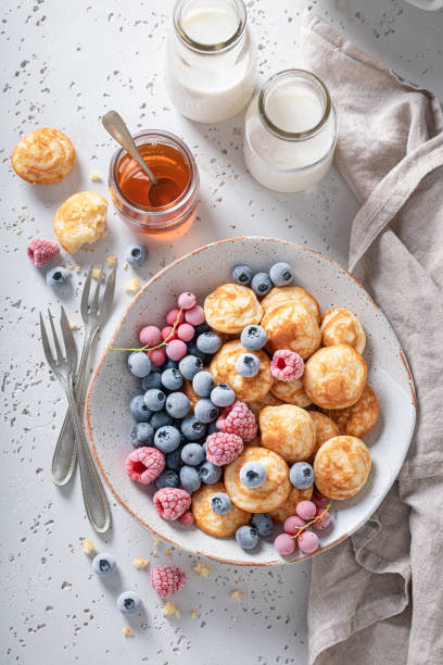 istock Dutch poffertjes for tasty and fresh breakfast. 1367652556