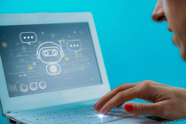 istock Female hand engaged in a chatting conversation with an automated digital chatbot. 1367653872